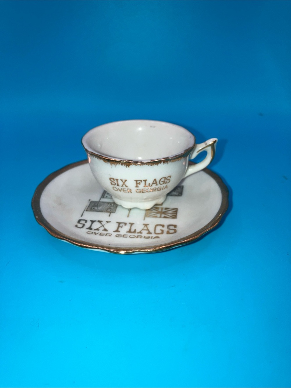Six Flags Over Georgia Mini Porcelain Teacup & Saucer - White with Gold Trim